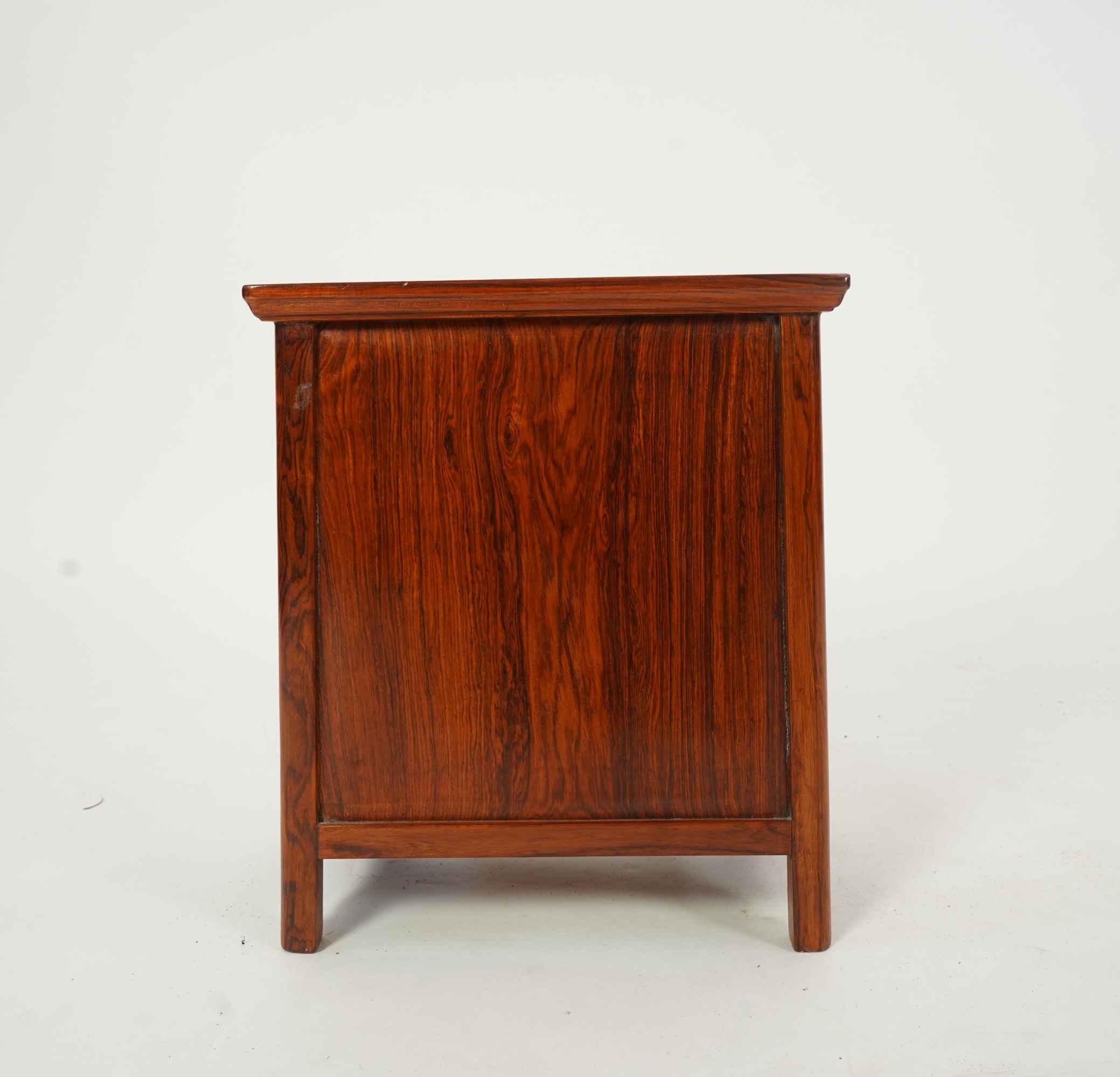 A Chinese huanghuali and burrwood panelled round-corner kang cabinet, 20th century